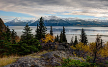 Travel along the Turnagain Arm between Anchorage and Seward.